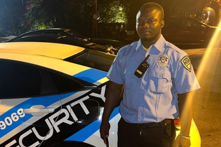 Officer-with-security-car