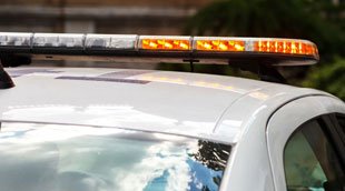 Top of a security vehicle with lights.